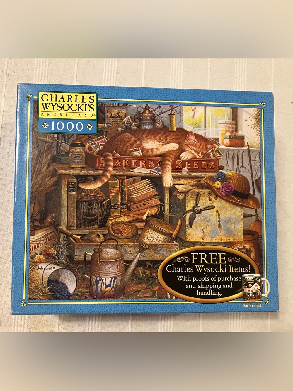 Unopened Charles Wysocki 1000 Pc Puzzle - Sleeping Cat and Gardening Shed